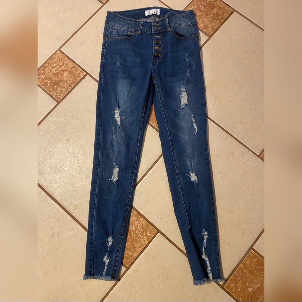 ripped blue jeans